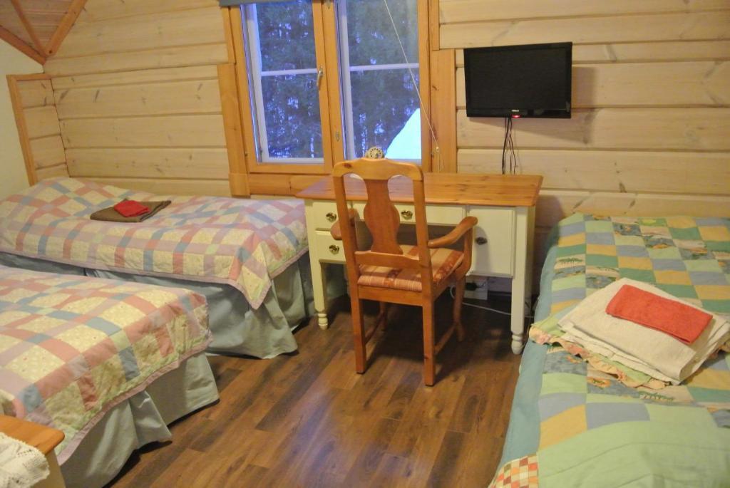 איסלמי Guest House Haapaniemen Hirsikartano חדר תמונה